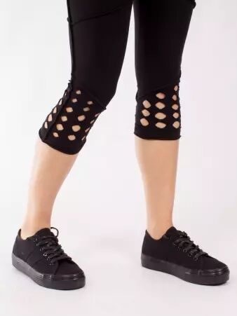 Legging Lazer cut Noir pi�ce mode structur�e pour un look urbain