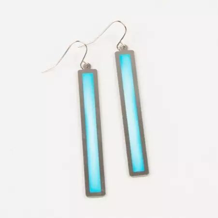 Boucle d'oreille Lign bleu turquoise accessoire bijou au style graphique
