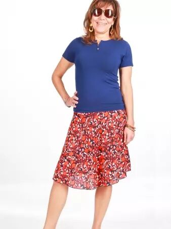 Jupe Esm� courte Majorque orange article textile au style affirm�, id�al en superposition au tomb� naturel
