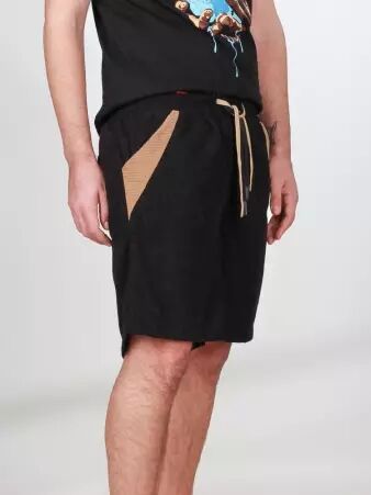 Short velours Wally poches cot�s Noir short noir en velours au style intemporel